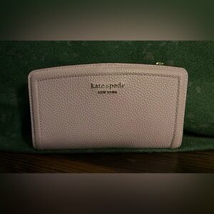 Kate Spade Lavender Knott Slim Pebbled Leather wallet